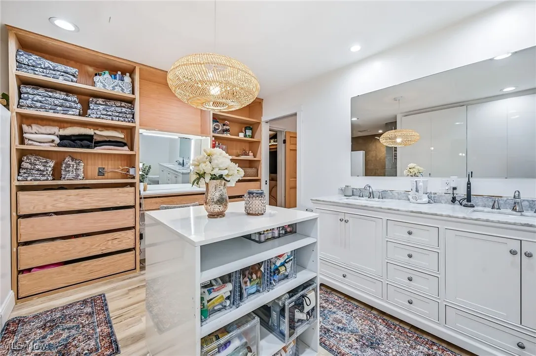Maple closet system and vanity allows for hassle-free mornings