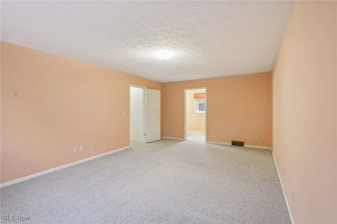 With separate ensuite nook with a built-in vanity