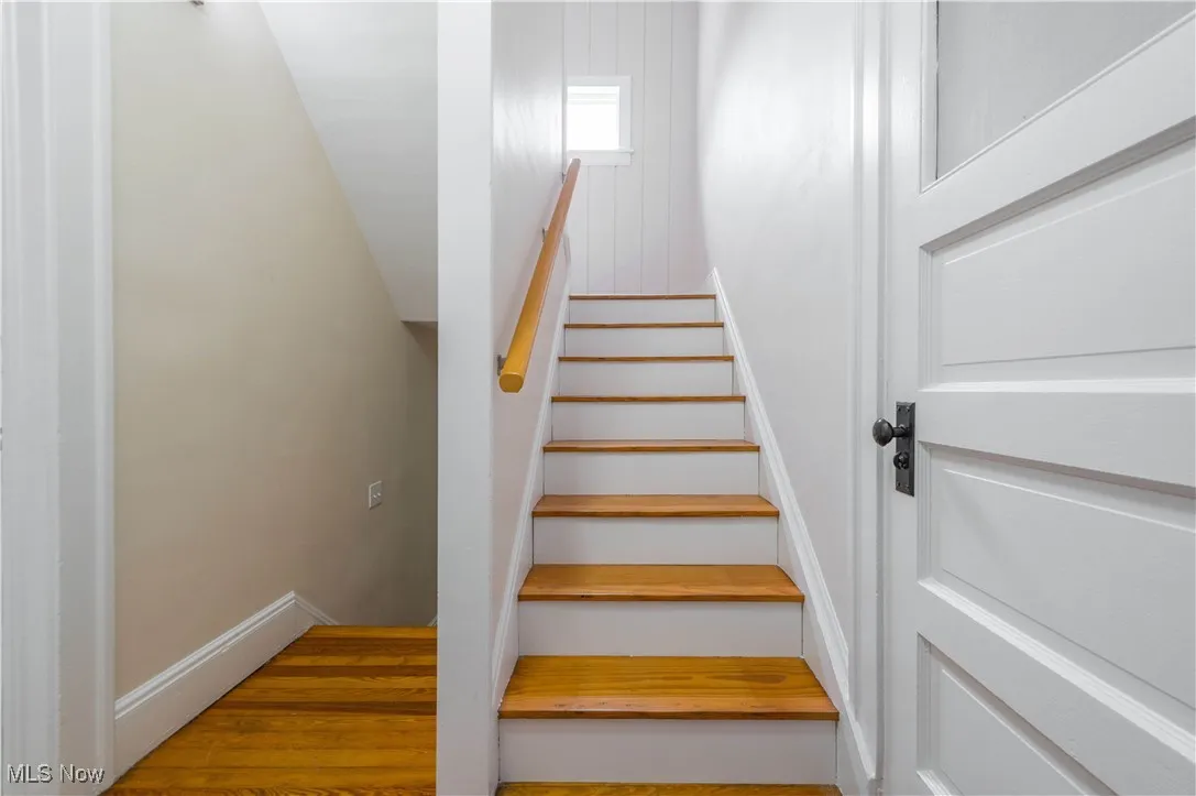 Staircase with wood finished floors