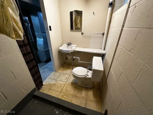 Bathroom featuring toilet and a sink