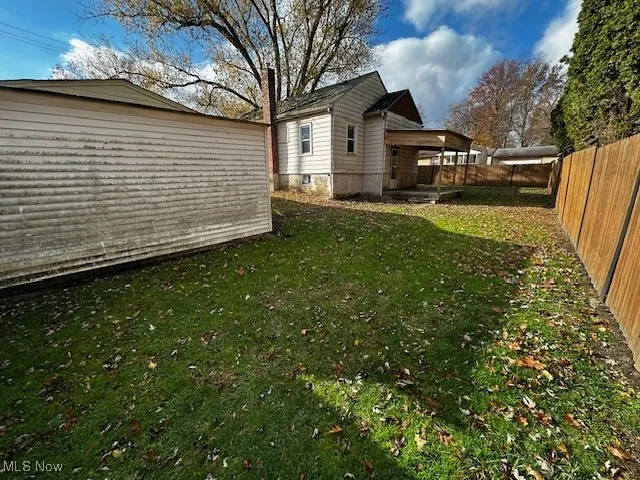 View of fenced backyard
