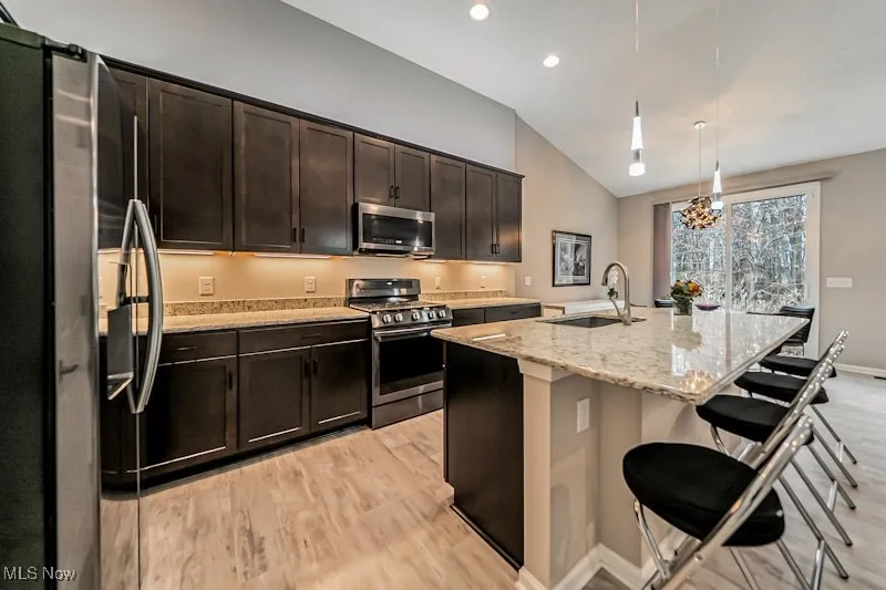 Under and over cabinet lighting.  Stainless appliances stay