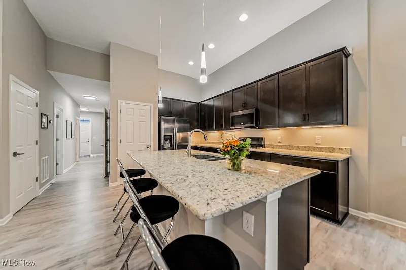 With Pantry, huge island and granite tops
