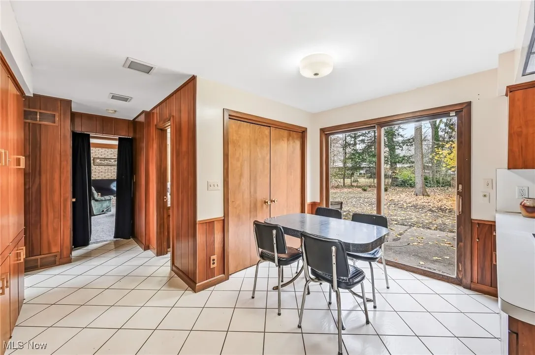 Breakfast area with pantry and sliding glass doors to back patio