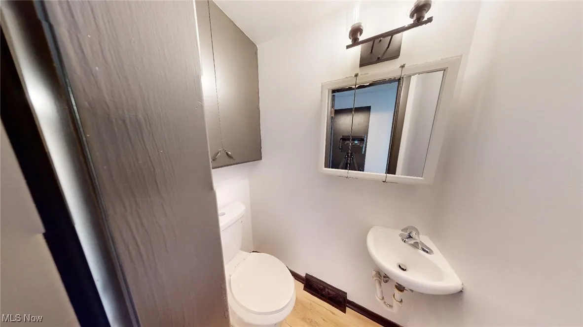 Bathroom with toilet and a sink