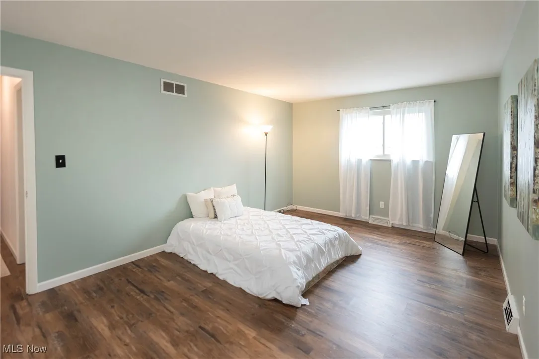 Lovely bedroom feels like a sanctuary! With HUGE walk-in closet