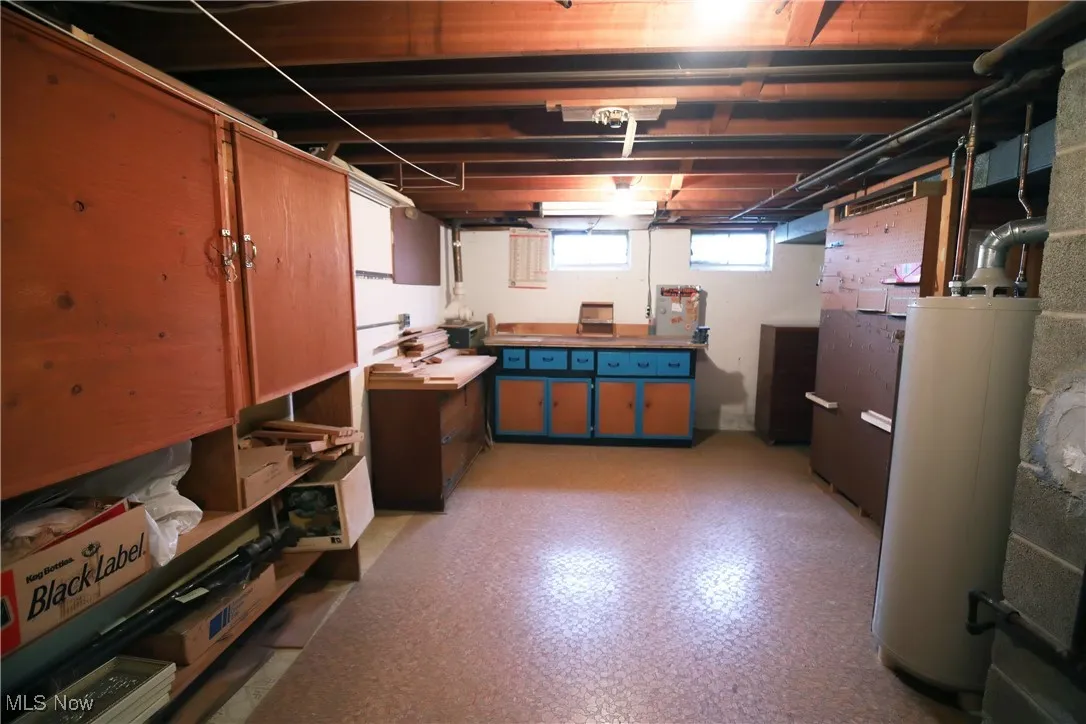 Below grade area with light floors and water heater