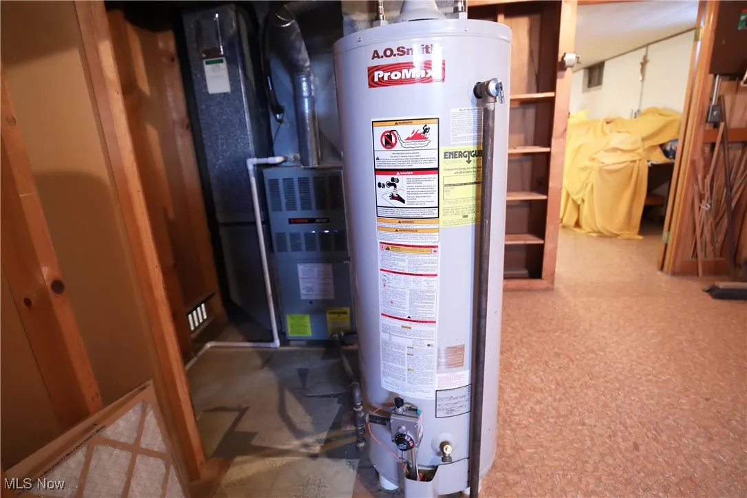 Utility room with gas water heater