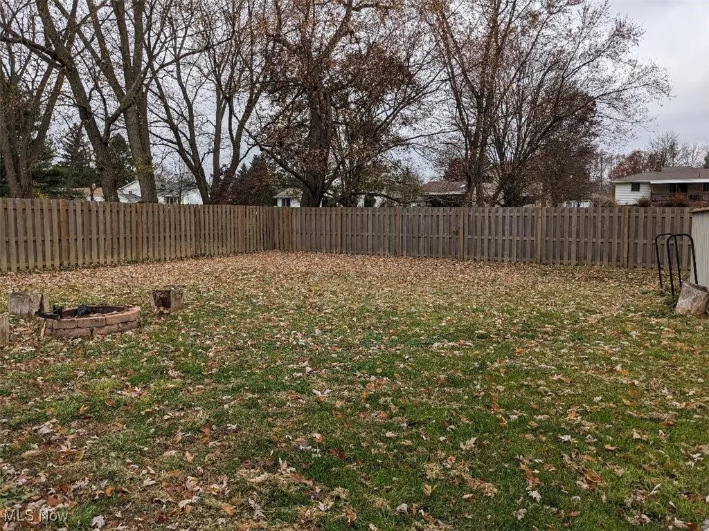 View of fenced backyard