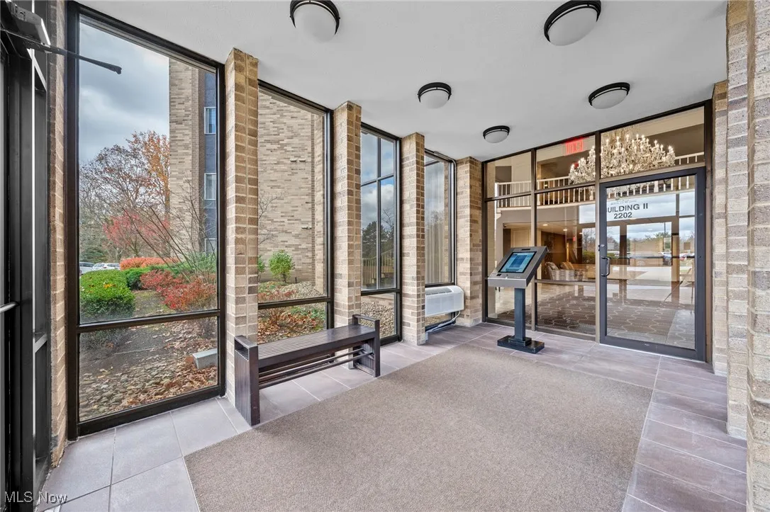 Workout room featuring floor to ceiling windows