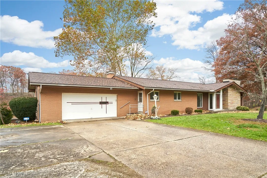 Front of the home with extra parking