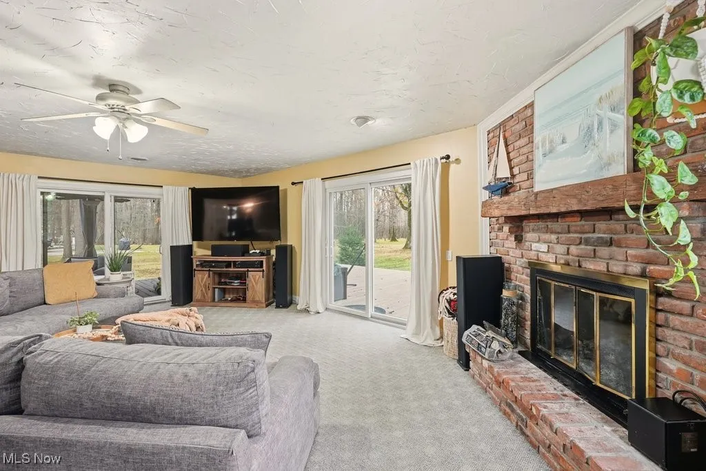 Family Room with Fireplace and Leads to a Wrap Around Deck