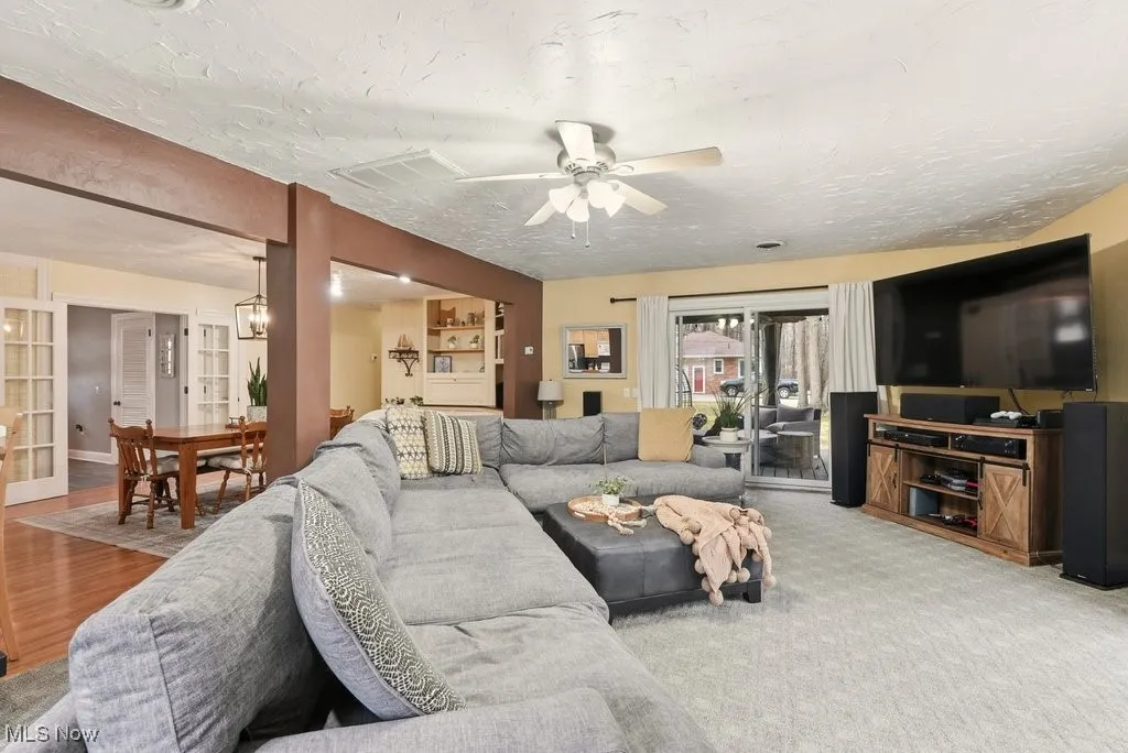 Family Room with Fireplace and Leads to a Wrap Around Deck