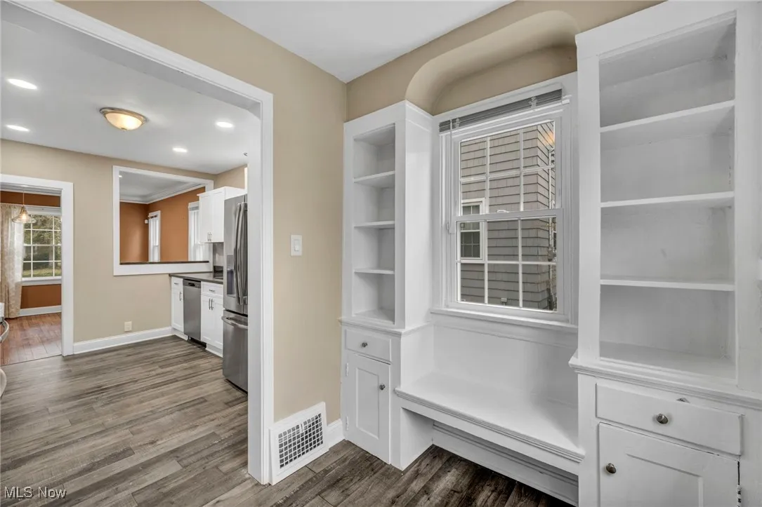 Mudroom featuring dark wood-type flooring and recessed lighting