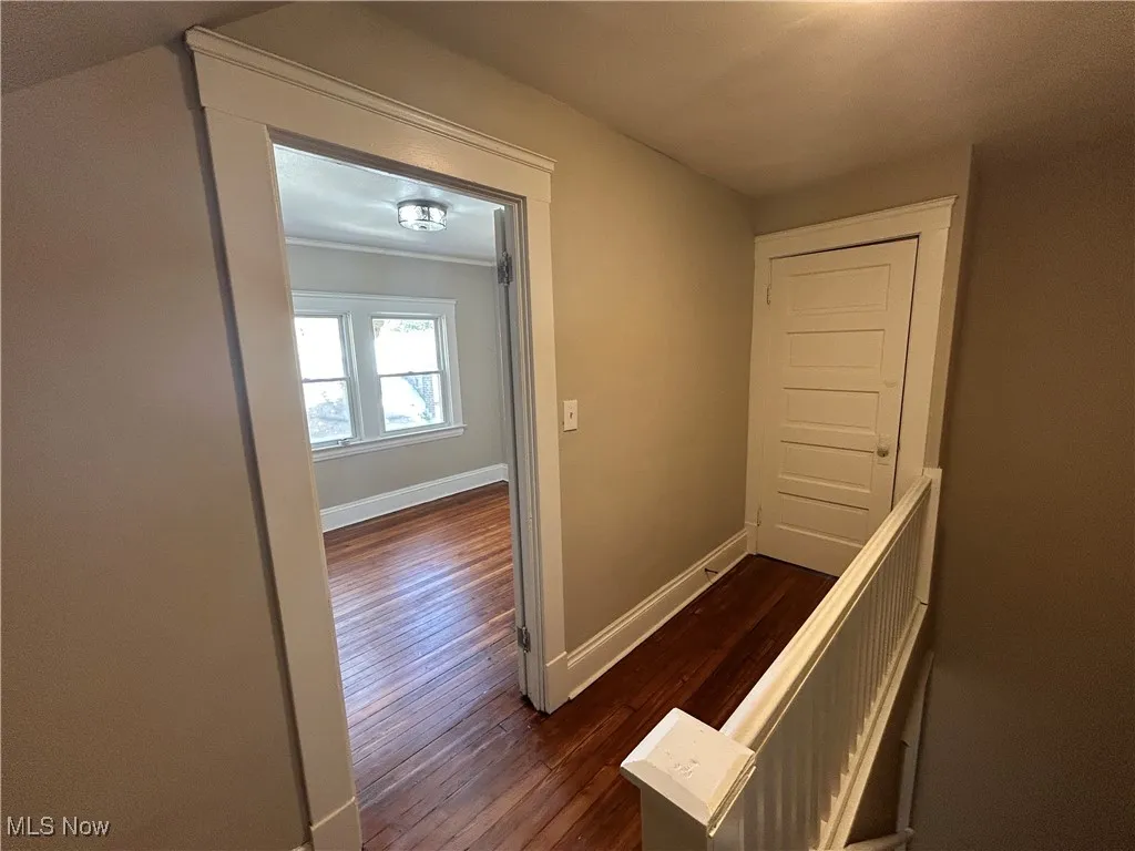 Hallway to attic and 4th bedroom