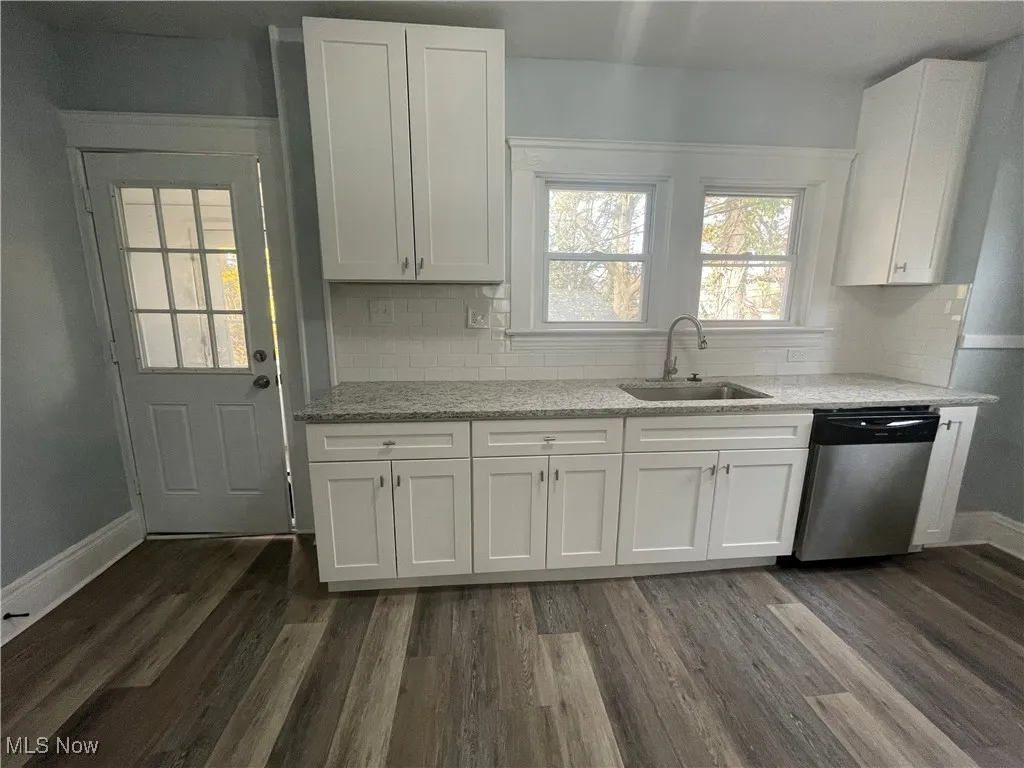Full renovated ktichen with white shaker cabinetry