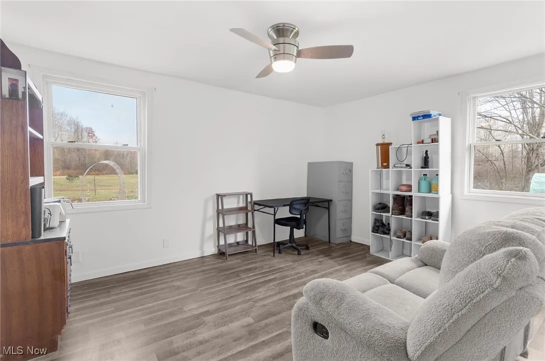 Bedroom with light wood-style floors, a ceiling fan, and plenty of natural​​‌​​​​‌​​‌‌​‌‌​​​‌‌​‌​‌​‌​​​‌​​ light