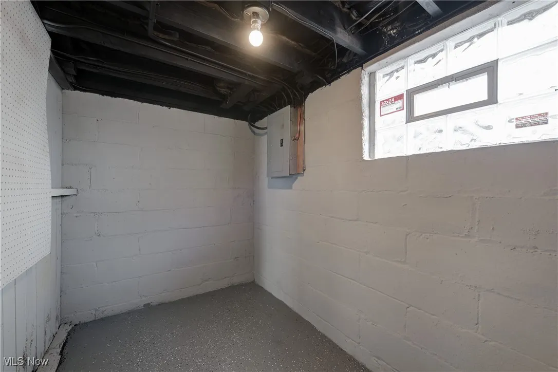 Below grade area with electric panel