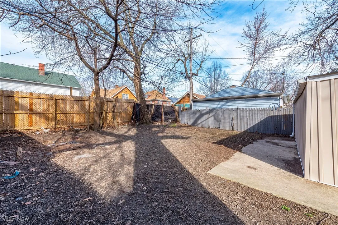 View of fenced backyard