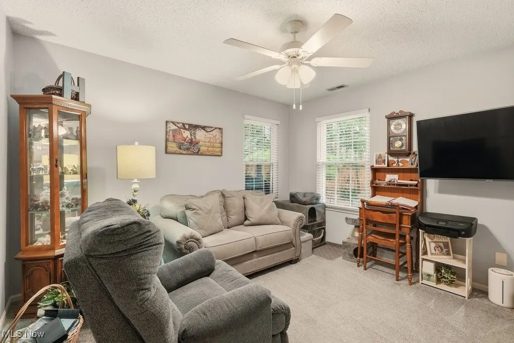Bedroom staged as sitting room