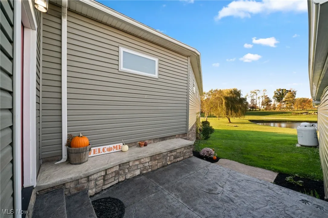 View of patio featuring a water view