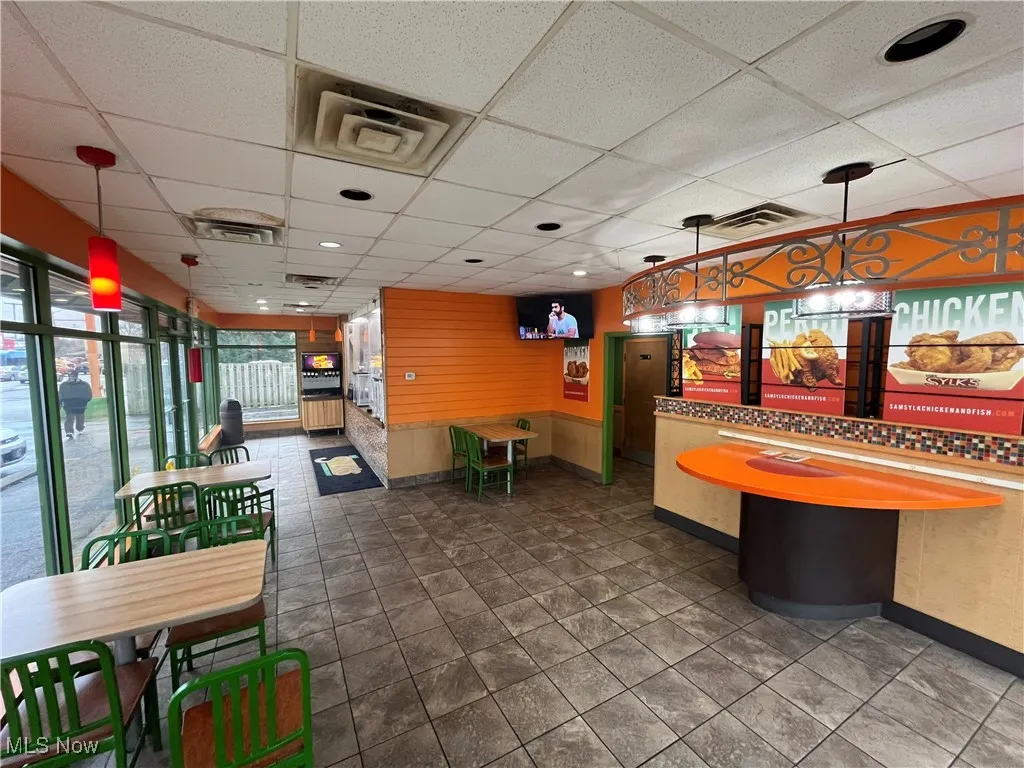 Welcome area with a paneled ceiling and wood​​‌​​​​‌​​‌‌​‌‌​​​‌‌​‌​‌​‌​​​‌​​ walls