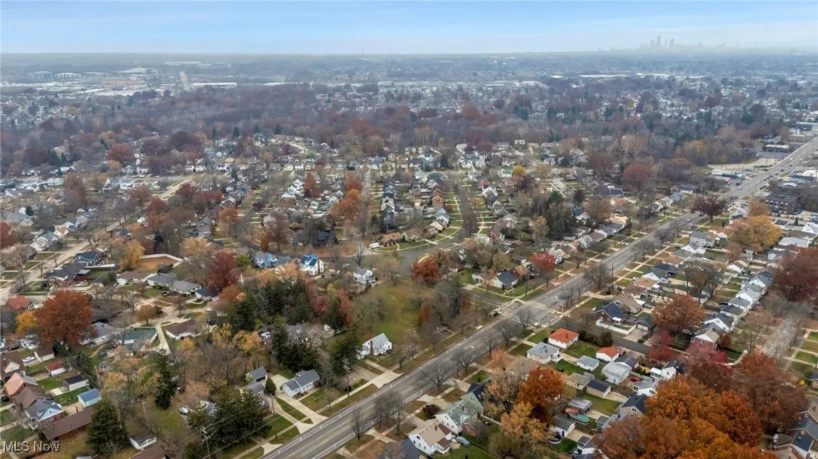 View of property location with nearby suburban area