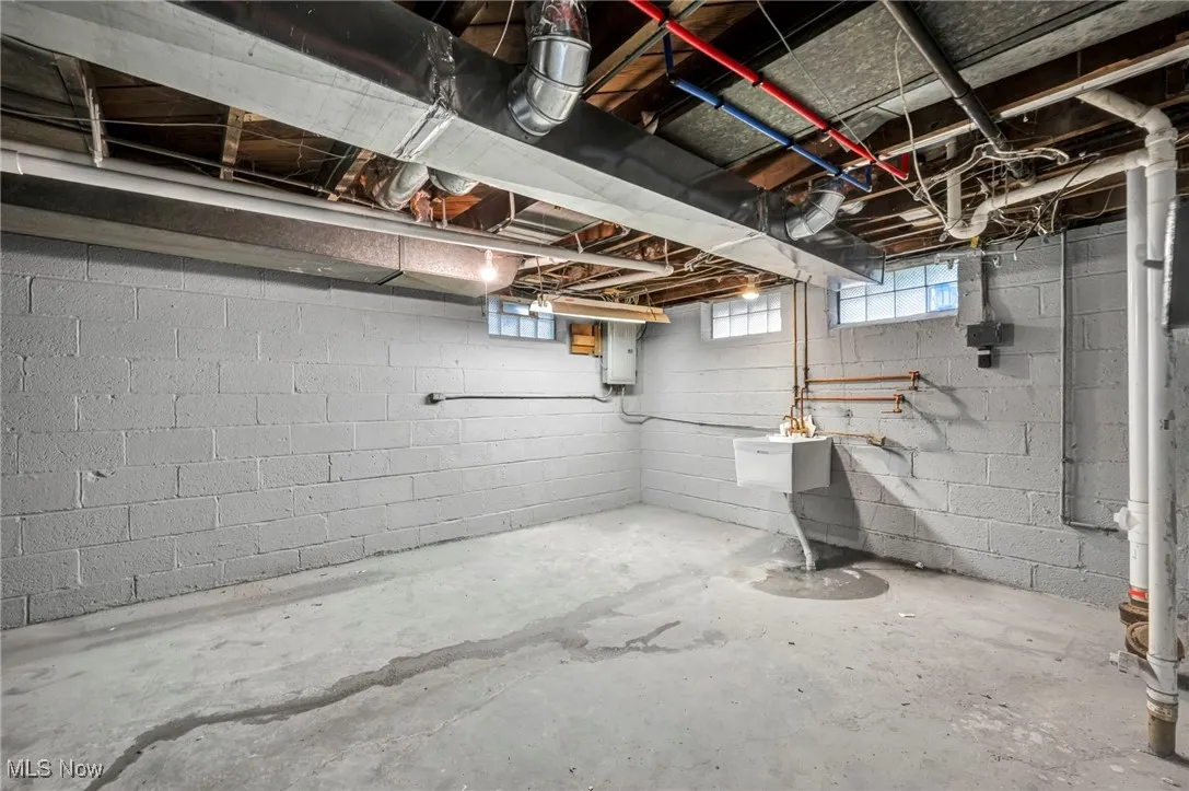 Below grade area with electric panel