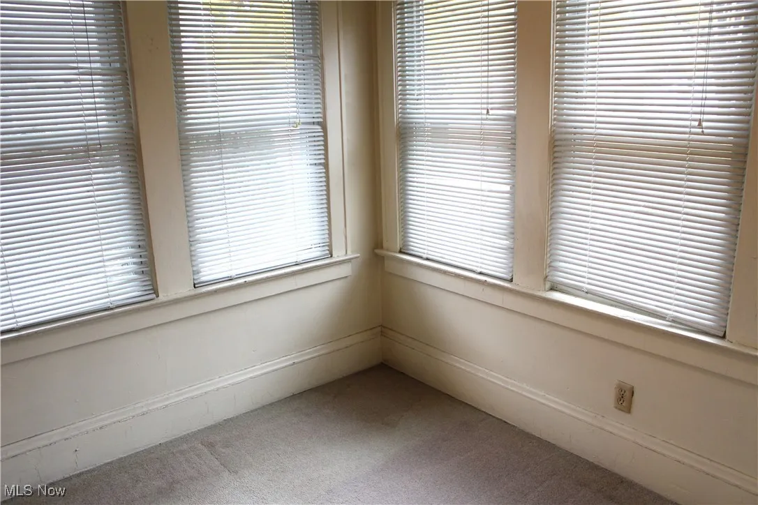 sunroom featuring healthy amount of natural light