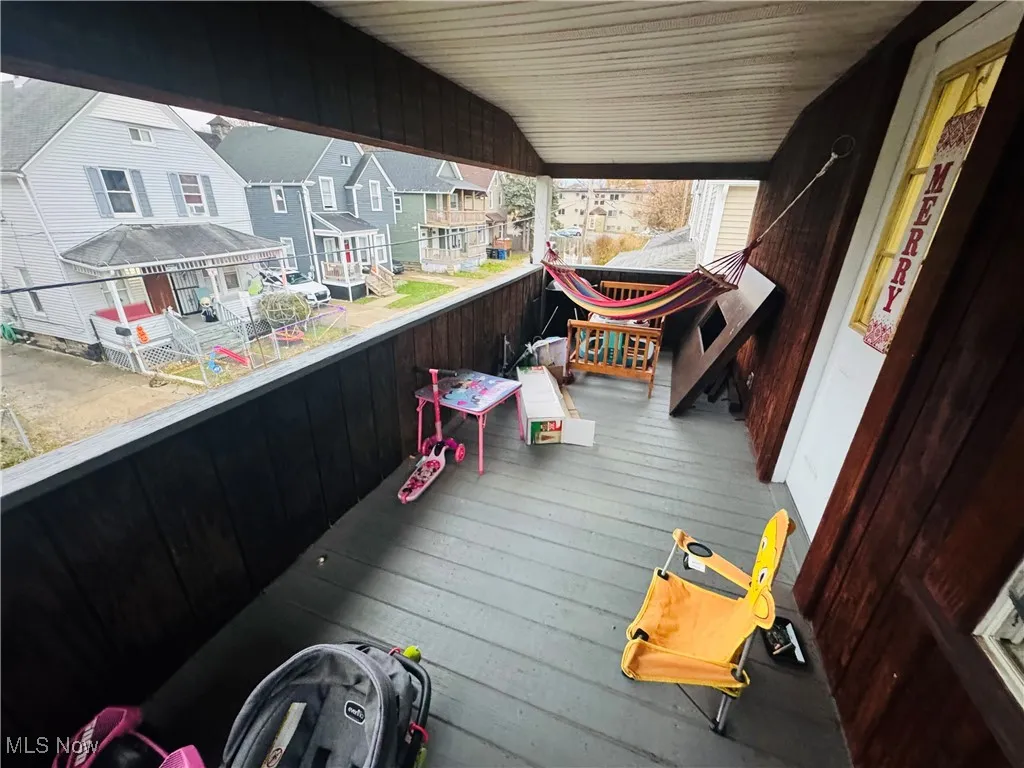 Balcony featuring a residential view
