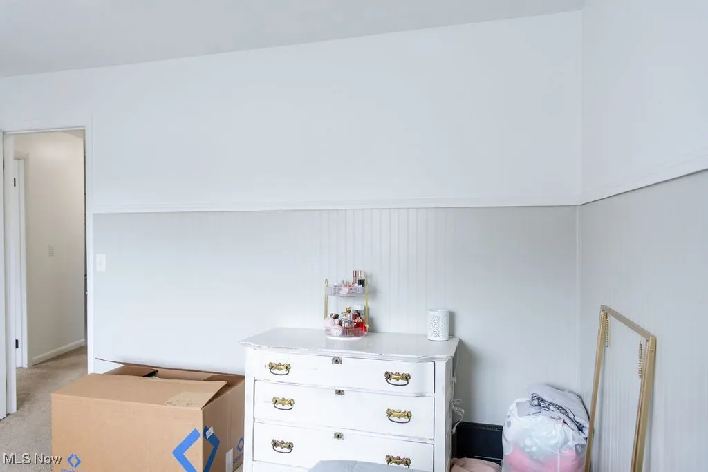 Bedroom with wainscoting