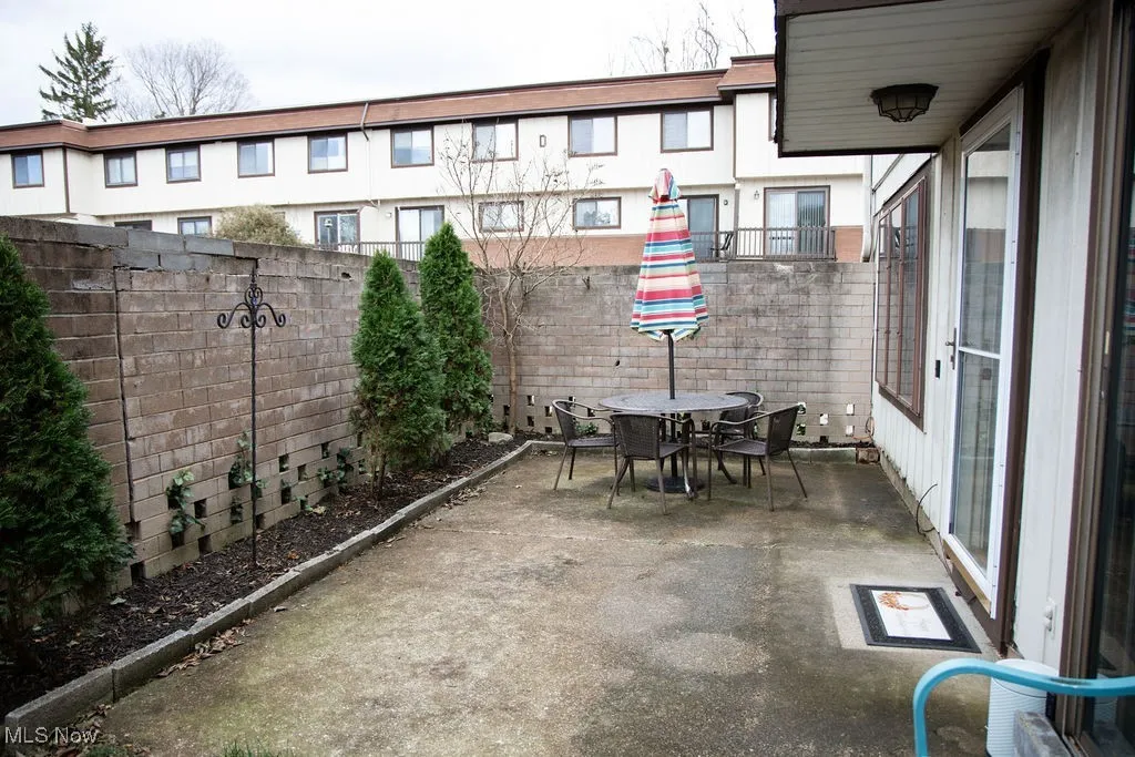 Fenced backyard featuring a patio area and outdoor dining space