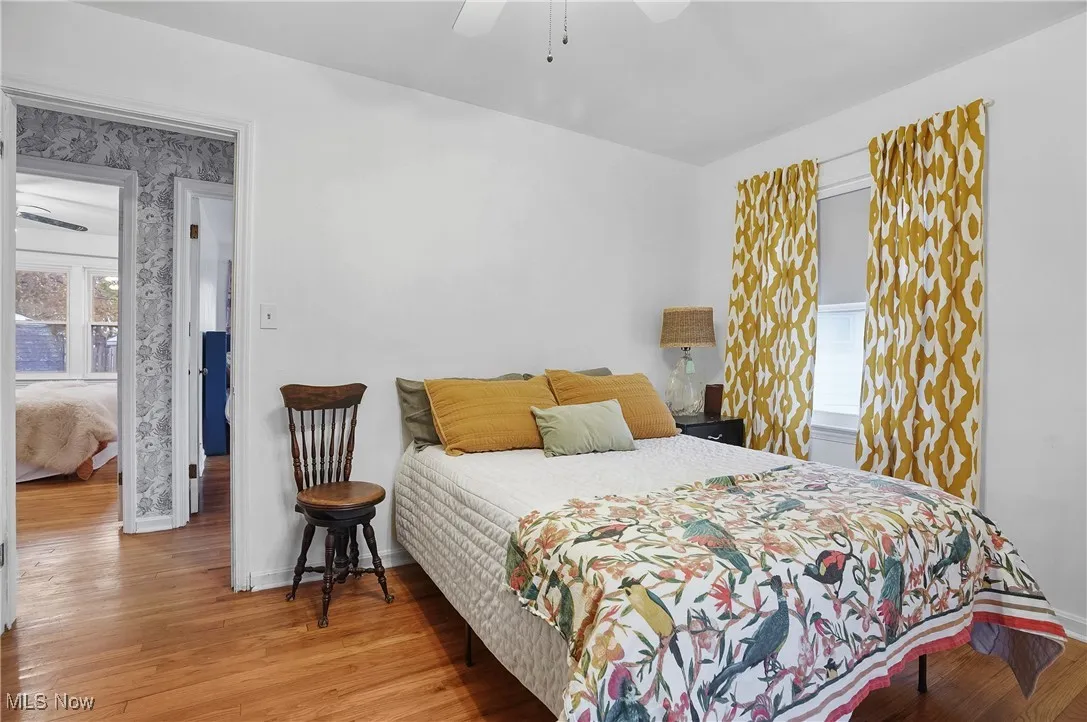 Bedroom featuring light wood-style floors and ceiling fan