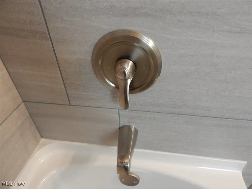 Quality Tile work and upgraded fixtures.