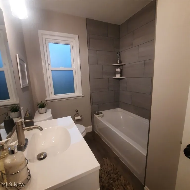 All new Full bathroom with artfully chosen Vanity, toilet and shower / tub combination, tile & flooring.