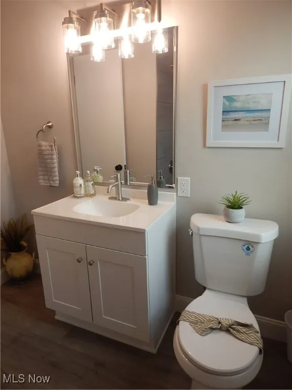 All new Bathroom featuring new white vanity, flooring, toilet and fixtures.