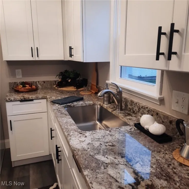 Gorgeous Granite Counters overlook new window.
