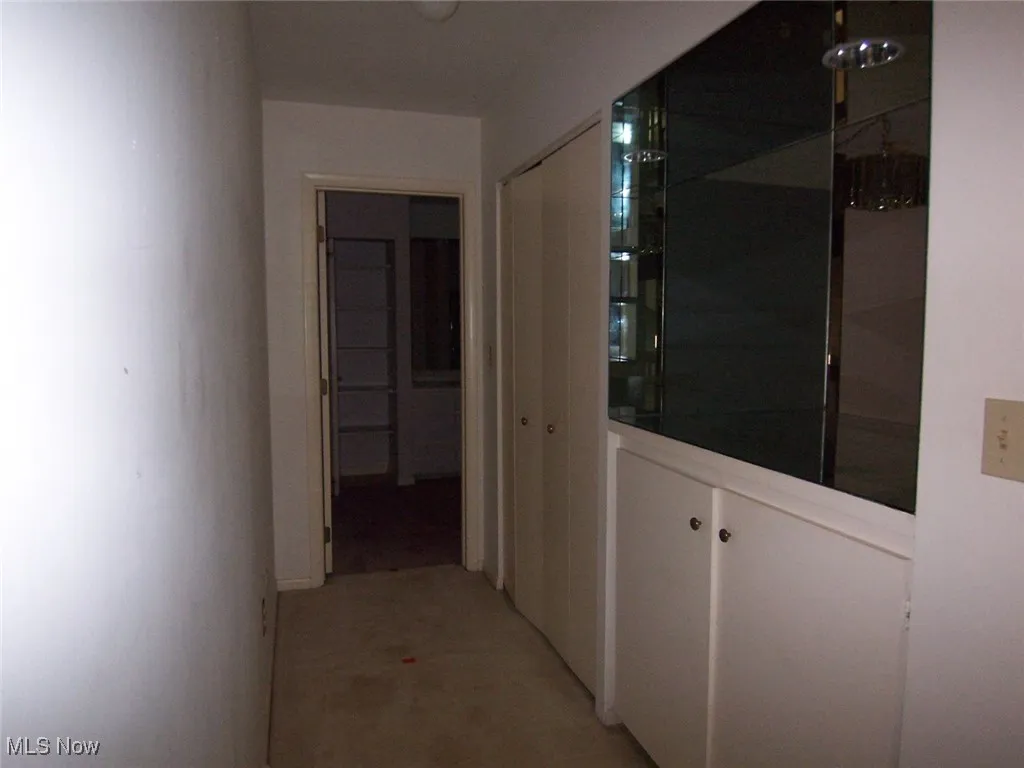 View of corridor with wall of built-ins on 2nd floor