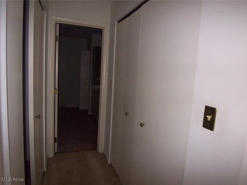 Wall of closets in bedroom