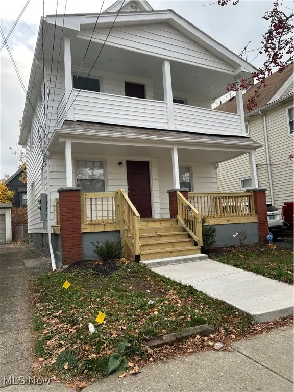 View of front of house with covered porch