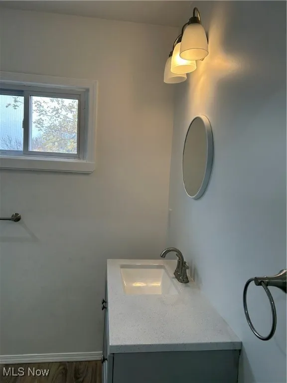 Bathroom with baseboards and vanity