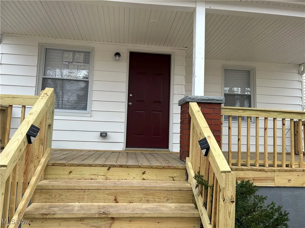 Entrance to property with a porch