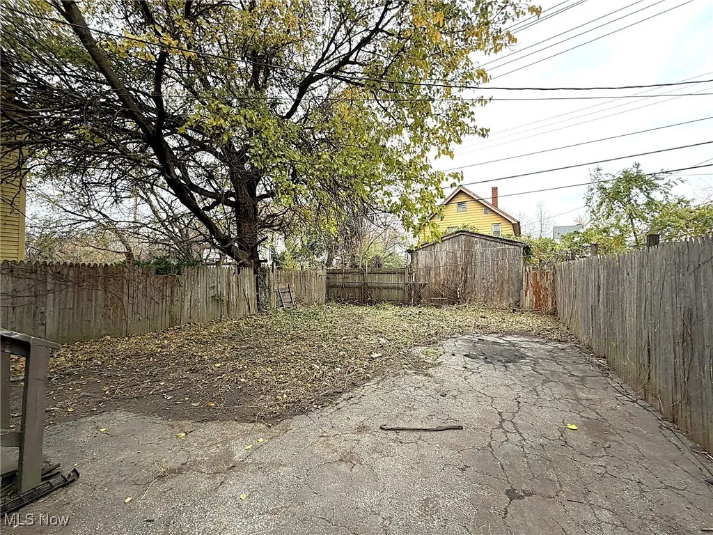 View of fenced backyard