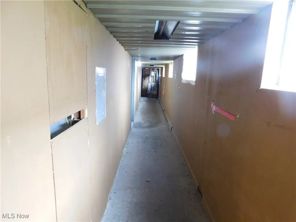 Hallway with concrete floors