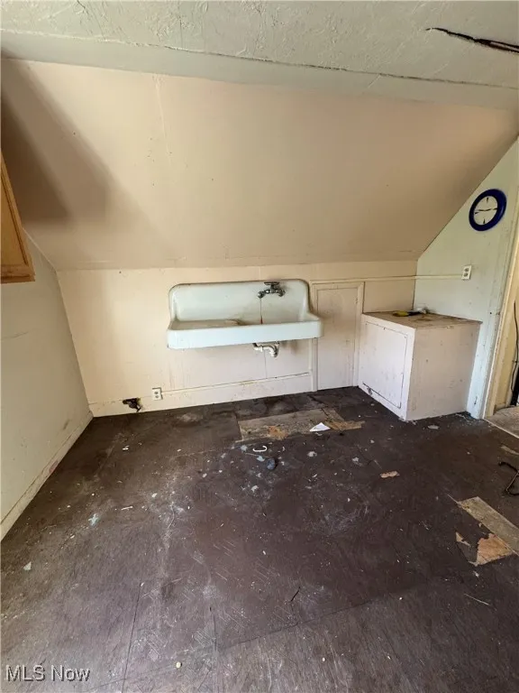 Additional living space with vaulted ceiling