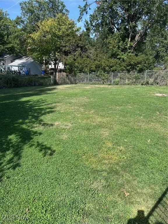 Partially fenced large back yard
