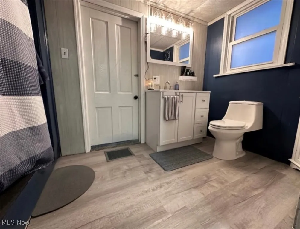 Bathroom with vanity and tub/shower combo