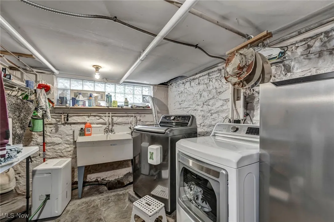 Laundry room with separate washer and dryer