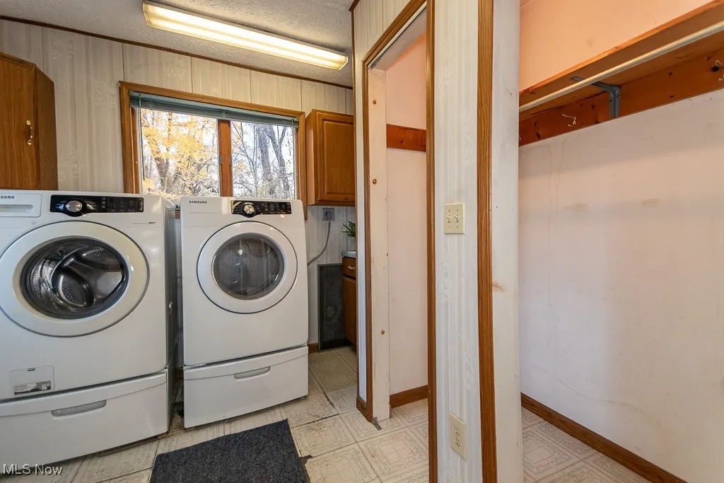 Washer and dryer stay! Cabinets, Closets, countertops, and natural light