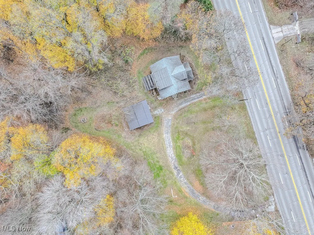 Aerial with full shot of horseshoe driveway